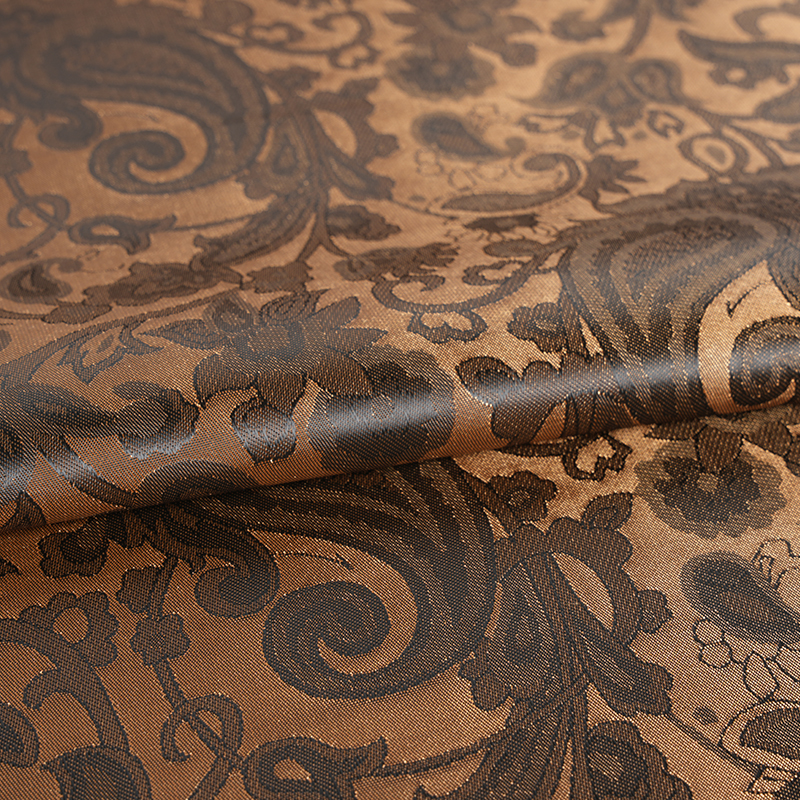 Jacquard med bågad lutblomma i polyester